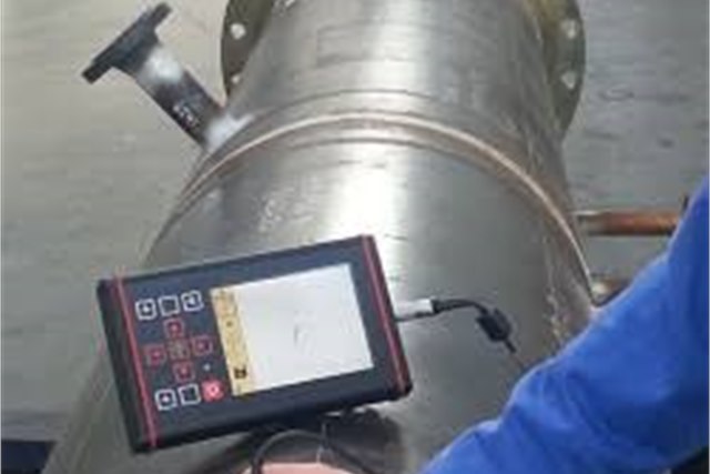 Eddy current testing probe in use